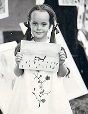 Childhood Susan Stockdale holding painting